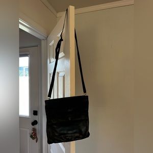 Sseko black convertible clutch/crossbody. Nice, quality leather!
